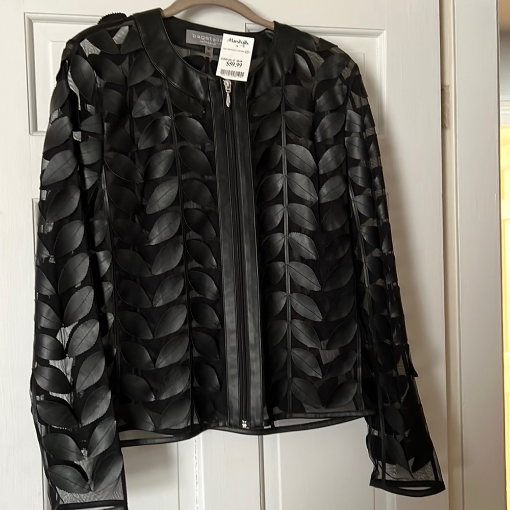 Sheer long sleeve w/“pleather” leaf detailing. Size M